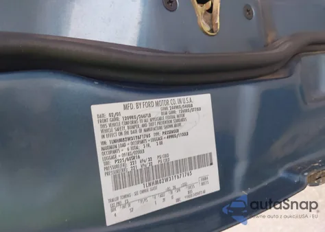 2001 Lincoln Town Car Signature z USA, uszkodzony, nr VIN 1LNHM82W31Y671765